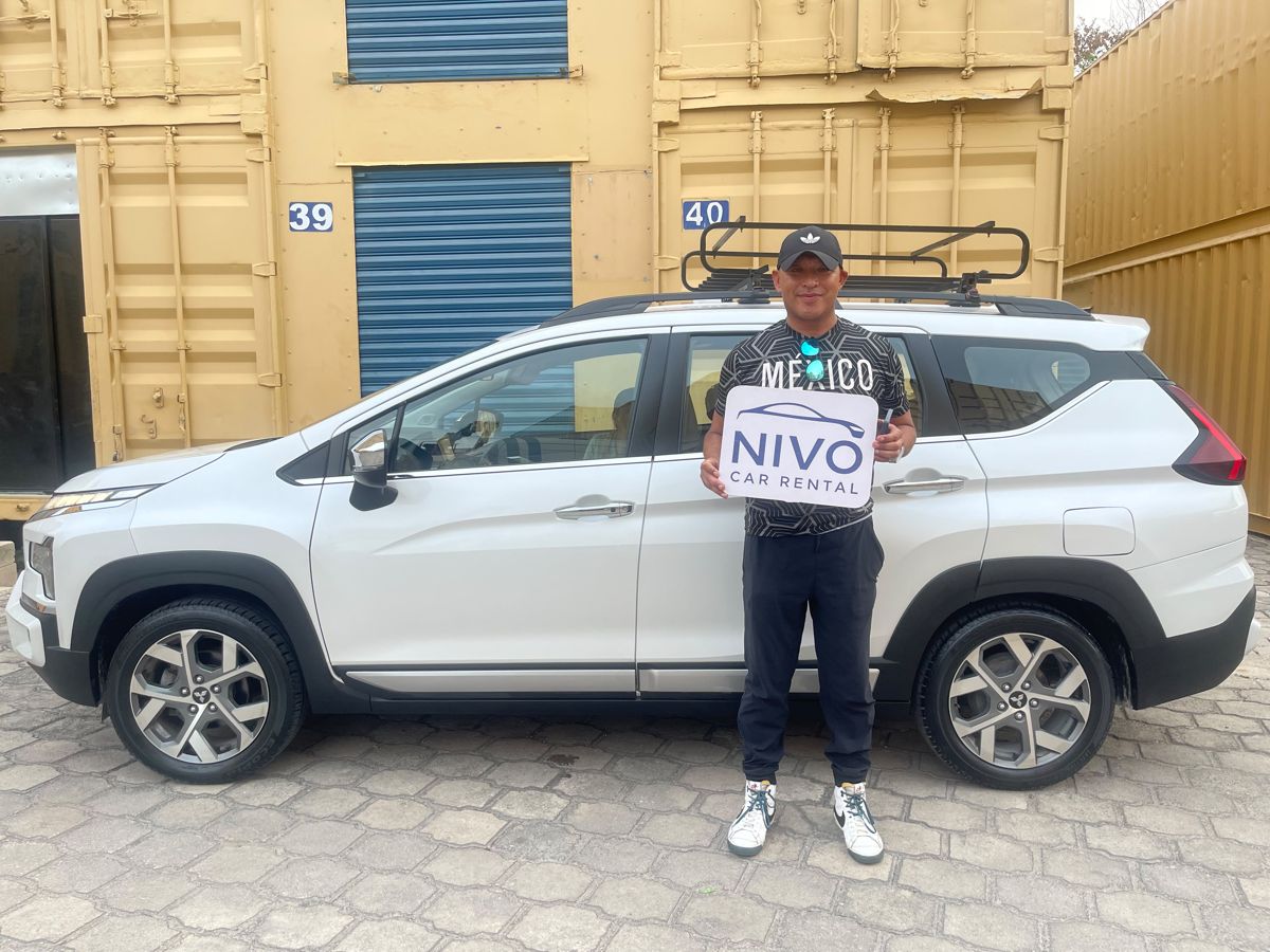 Cliente feliz de Nivo Car Rental en Cancún — entrega Julio 10